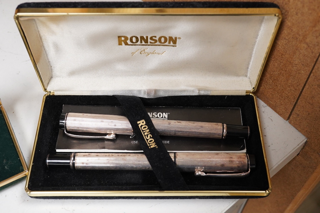 A quantity of boxed fountain pens and ballpens